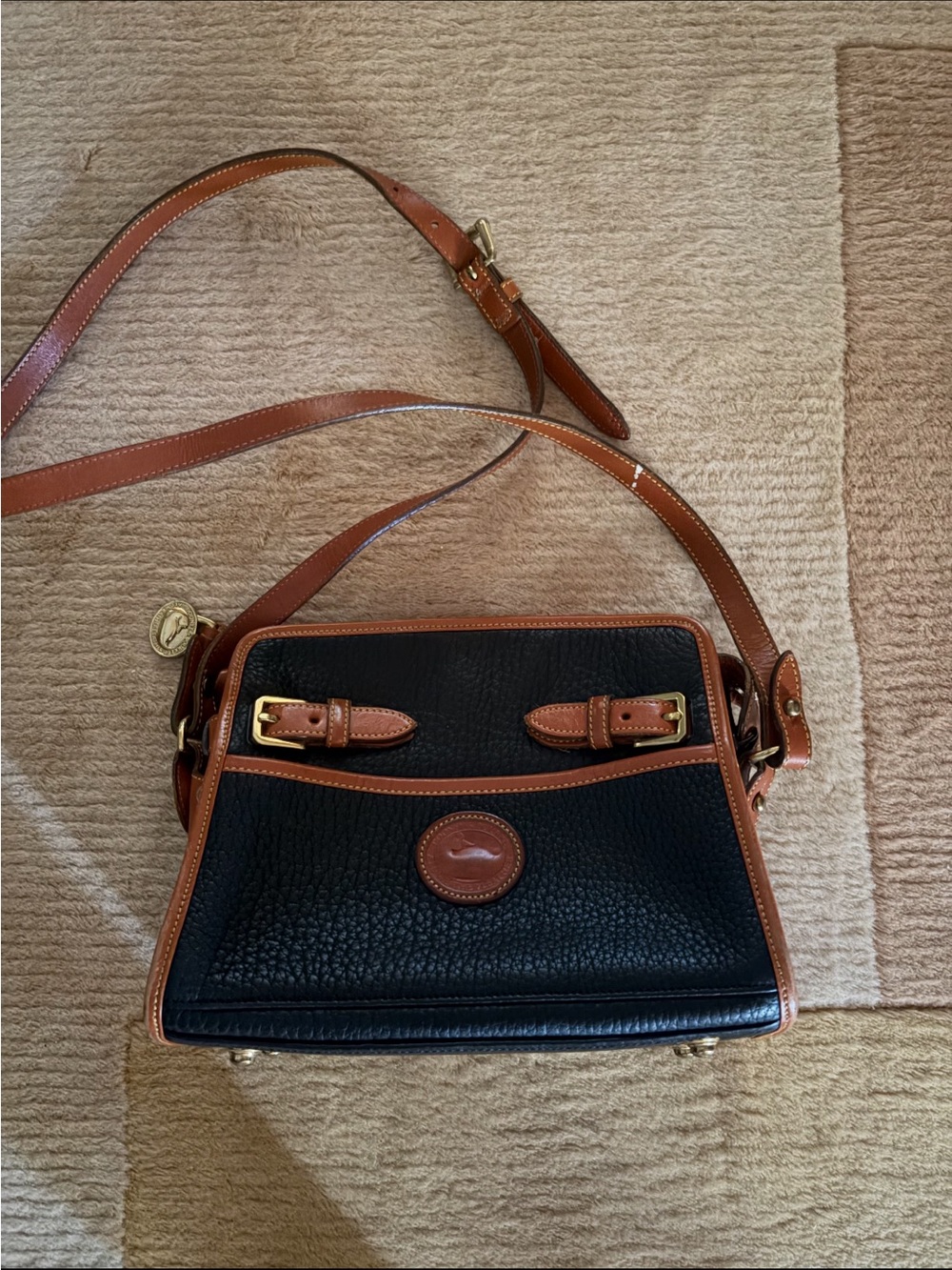 Dooney & Bourke Black with Brown Trim Pebbled Leather Crossbody